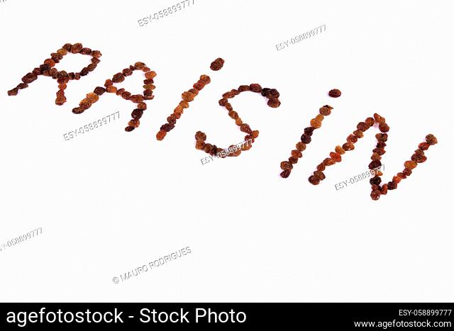 Close view of the word raisin formed by raisins