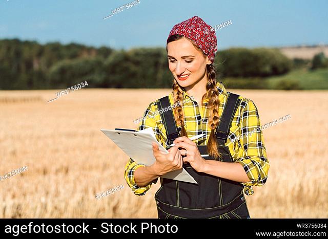 Farmer doing business administration and controlling on the field