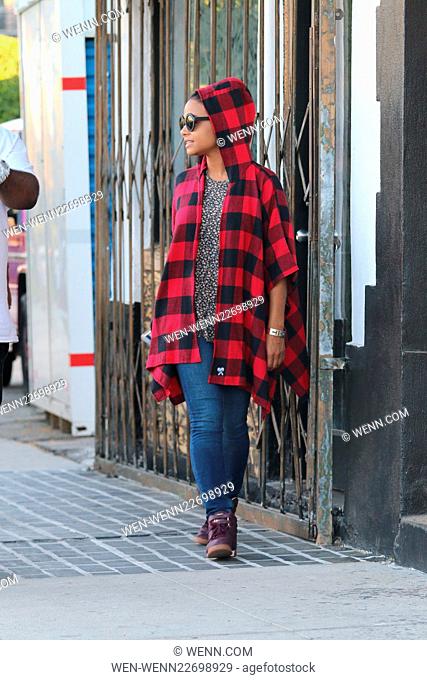 Christina Milian out and about in West Hollywood wearing a black and red checked coat Featuring: Christina Milian Where: Los Angeles, California