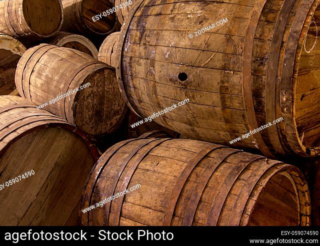 several wooden barrels closeup