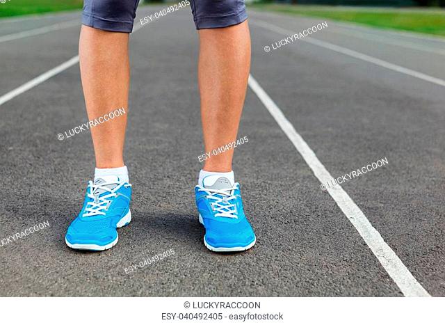 Runner Feet Running on Stadium Closeup - outdoor shot