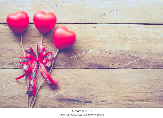 Valentines Day background with three hearts for love