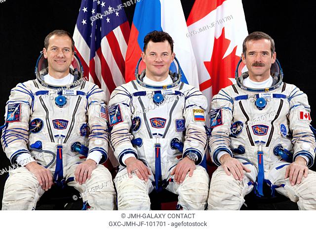 Canadian Space Agency astronaut Chris Hadfield (right), Expedition 34 flight engineer and Expedition 35 commander; along with Russian cosmonaut Roman Romanenko...