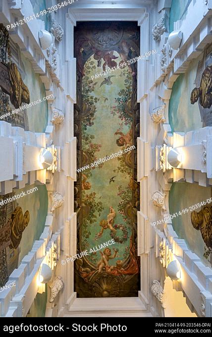 09 April 2021, Saxony-Anhalt, Magdeburg: This staircase with ceiling paintings and abundant stucco on the walls is located at Hegelstraße 16