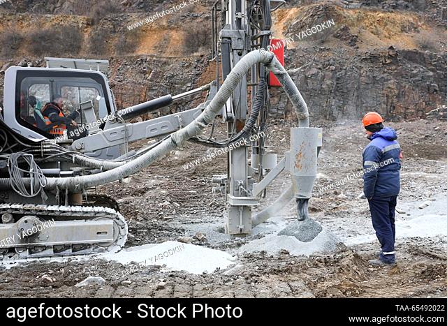 RUSSIA, DONETSK PEOPLE'S REPUBLIC - DECEMBER 5, 2023: Workers in Kalchiksky granite quarry run by the Nedra state corporation