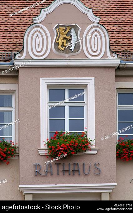 The close-up of a gable window of the town hall in Waldfischbach