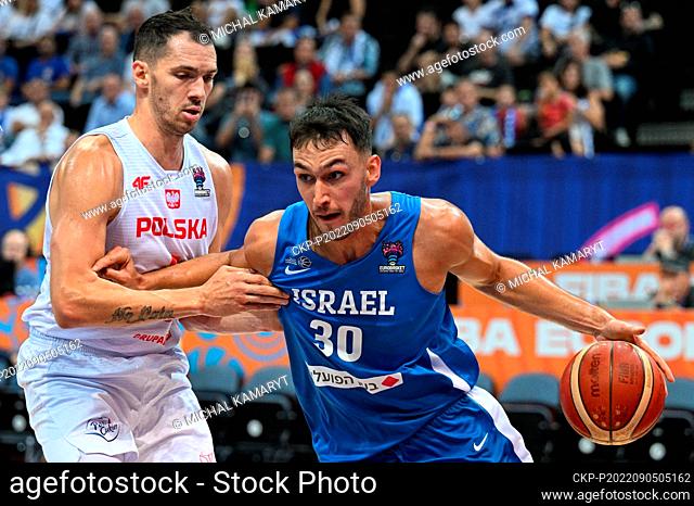 Aaron Cel of Poland, left, and Nimrod Levi of Israel in action during the European Men's Basketball Championship, Group D, match Poland vs Israel, in Prague