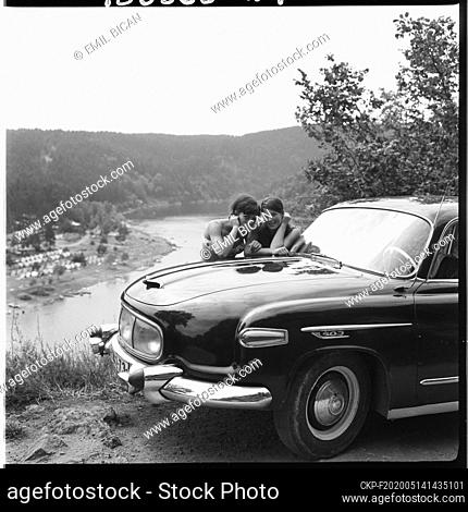 ***JULY 28, 1966 FILE PHOTO***Girls pose at the Car Tatra 603 for photographer near Vranovska Dam, Czechoslovakia, July 28, 1966