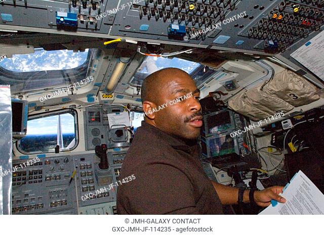 Astronaut Leland Melvin, STS-129 mission specialist, is pictured on the aft flight deck of Space Shuttle Atlantis during flight day two activities