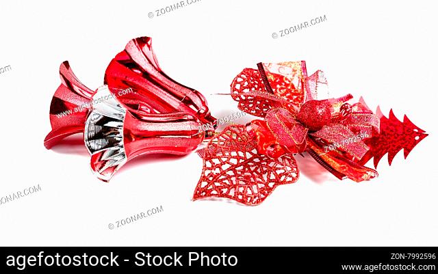 Red christmas bell decoration hanging on white background