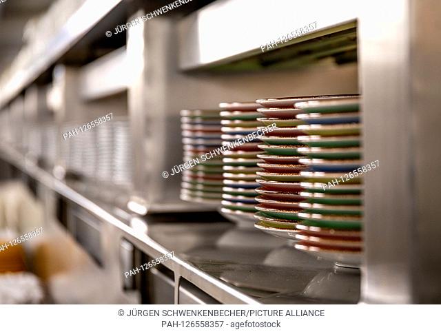 View of the plate rack in a kitchen of the cruise ship Mein Schiff 1. The kitchens of the ship, which seats 2, 894 passengers