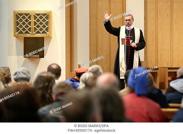 Hamburg's archbishop Stefan Hesse blesses a congregation of the homeless before their trip to Rome in Hamburg, Germany, 01 November 2016