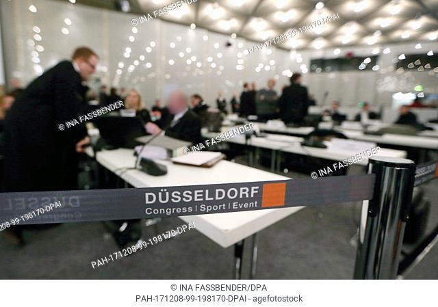 The defendants sit together with their lawyers in the trial hall during the start of the Loveparade trial in Duesseldorf, Germany, 8 December 2017