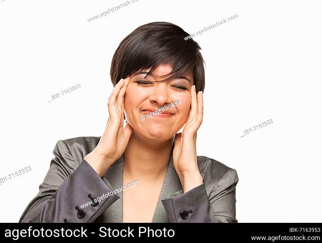 Grimacing biracial girl holding her head with her hands isolated against white background