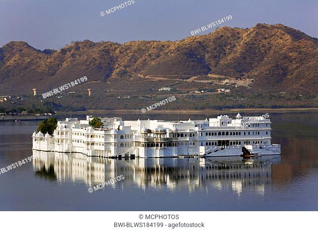 the LAKE PALACE HOTEL on JAGNIWAS ISLAND was built by Maharaja Jagat Singh ll in 1754 and rises from LAKE PICHOLA in UDAIPUR, India, Rajasthan