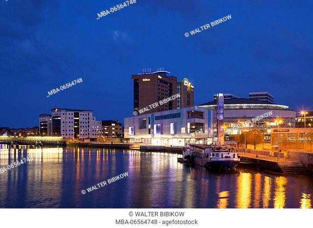 UK, Northern Ireland, Belfast, city skyline along River Lagan with Waterfront Hall, dusk