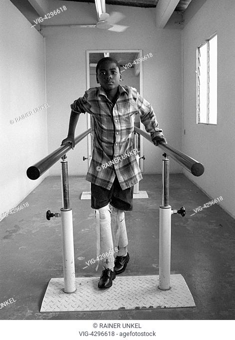 ANGOLA, LUANDA, 10.12.1993, AGO , ANGOLA : An amputated boy in an orthopedic centre of the ICRC in Luanda , he is a victim of the civil war in Angola