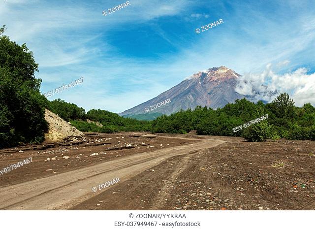 Road along dry river to the Volcano Koryaksky 3456 m on Kamchatka Peninsula