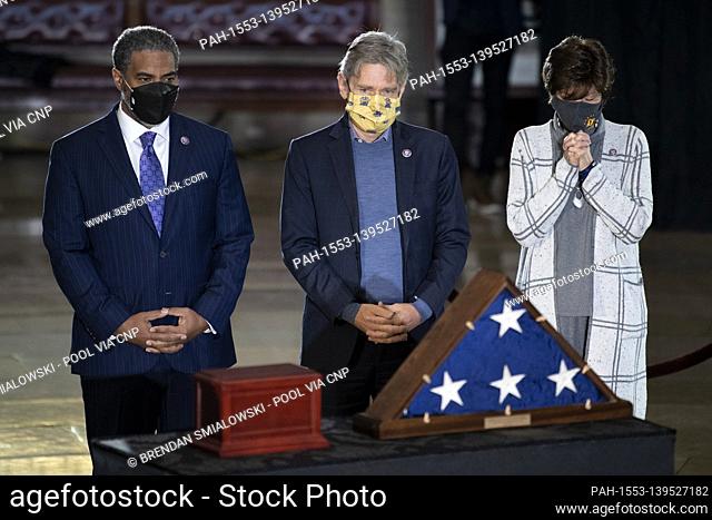 Lawmakers pay respects at the remains of Capitol Police officer Brian Sicknick lay in honor in the Rotunda of the US Capitol building after he died during the...