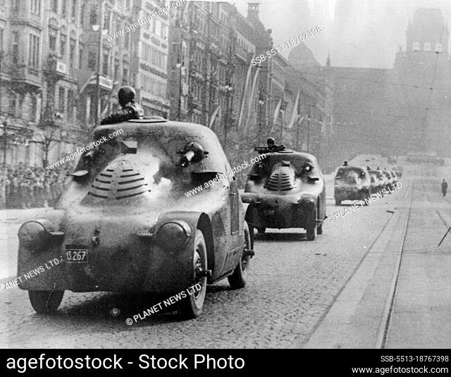 Czechoslovakia celebrates Fifteenth Anniversary of her foundation with display of Military Strength : Armoured cars through Prague -- The Armoured cars passing...