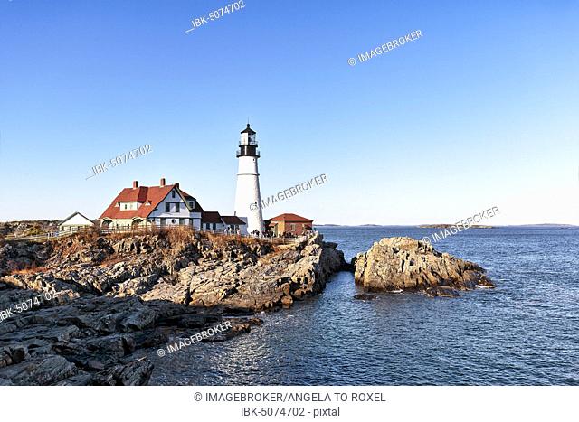 Lighthouse on rocky coast, Portland Head lighthouse, Cape Elizabeth, Portland, Maine, New England, USA, North America