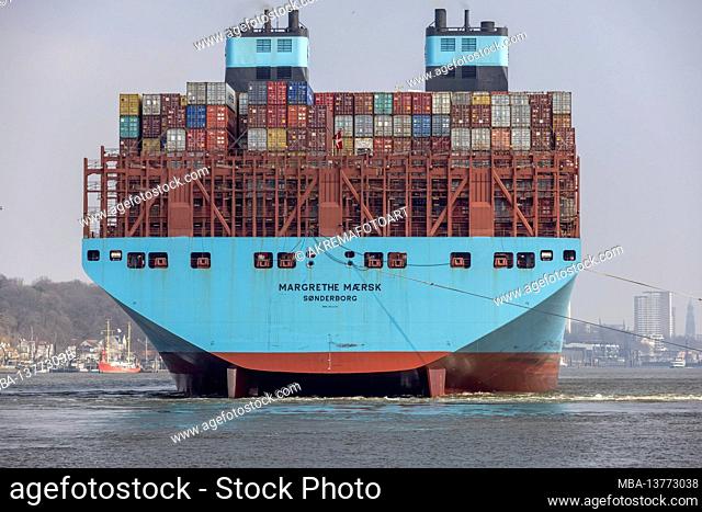 The container ship MARGRETHE MAERSK entering, turning and towing into the port of Hamburg