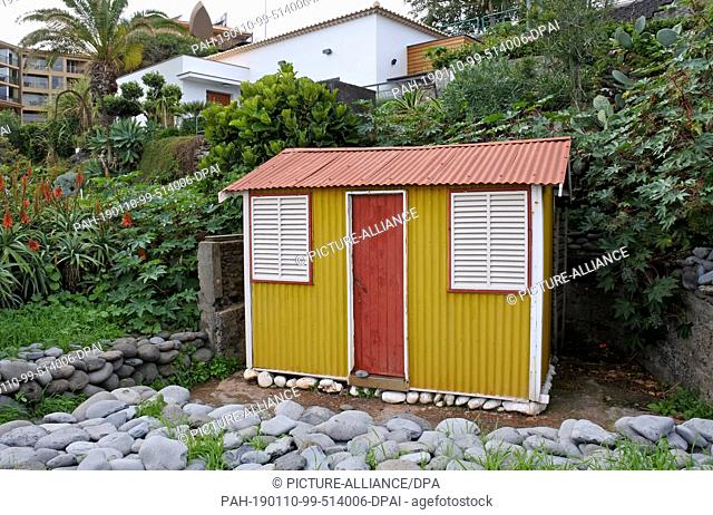 21 November 2018, Portugal, Caniço De Baixo: A fishing hut is located on the coastal promenade in Caniço de Baixo on the Portuguese island of Madeira