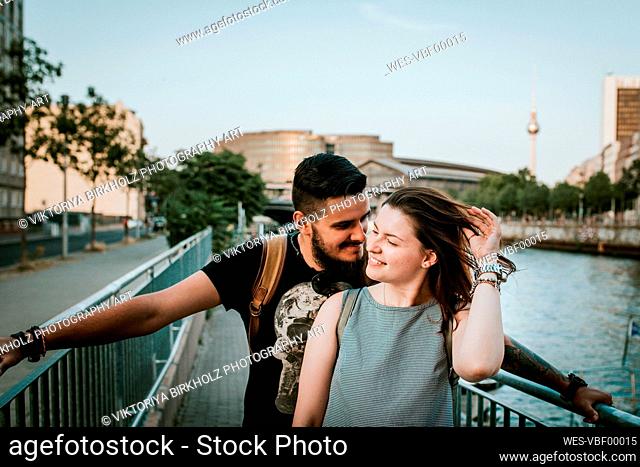 Happy young couple at River Spree, Berlin, Germany