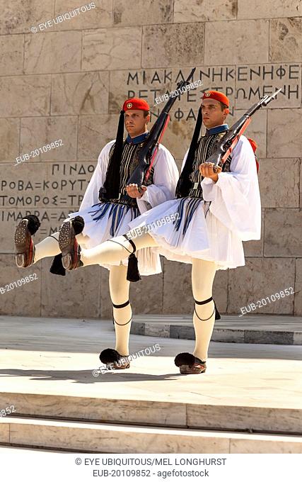 Greek soldiers, Evzones, marching beside Tomb of the Unknown Soldier, outside Parliament building