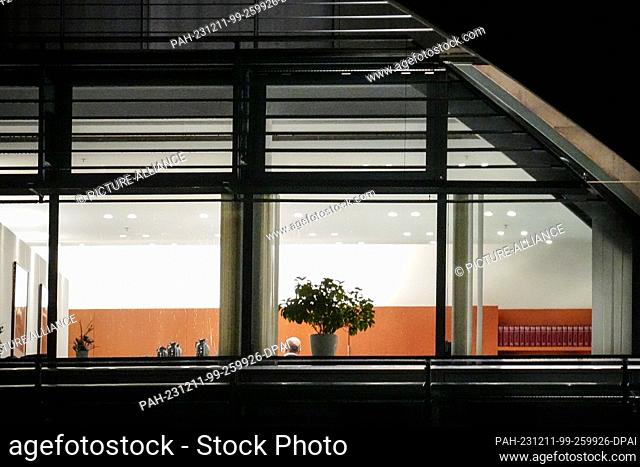 11 December 2023, Berlin: Federal Chancellor Olaf Scholz (SPD) sits in his office during consultations on the budget crisis