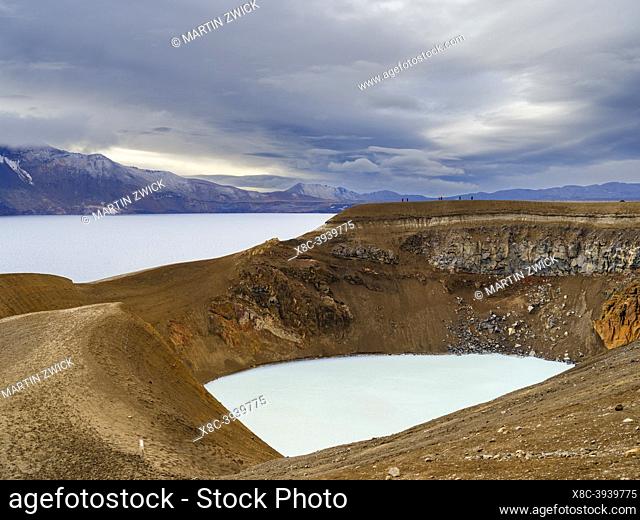 The small vocanic lake called Viti in volcano Askja. Lake Oeskjuvatn in the background. The north eastern interior highlands of Iceland in the Vatnajoekull...