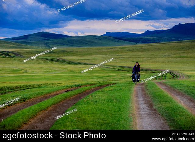 Cycling through the grasslands of the Mongolian steppe, Mongolia