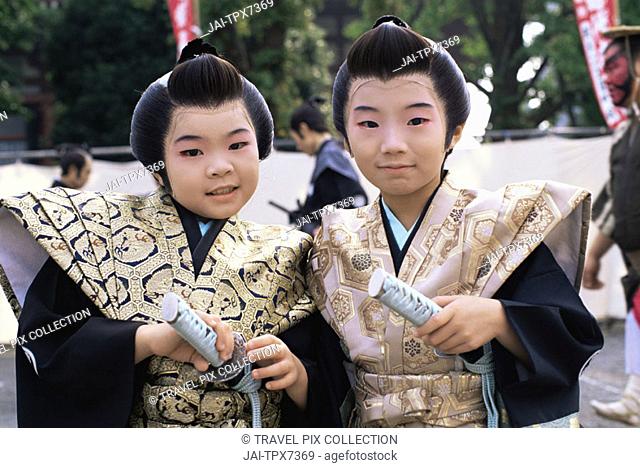 Japan, Honshu, Tokyo, Boys Dressed in Samurai Costume at Jidai Matsuri Festival held Annually in November at Sensoji Temple Asakusa