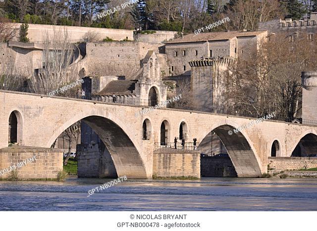THE SAINT-BENEZET BRIDGE, MORE COMMONLY CALLED THE BRIDGE OF AVIGNON, ONCE CROSSED THE RHONE BUT A PART OF IT WAS DESTROYED AND STILL TODAY HAS NOT BEEN REBUILT