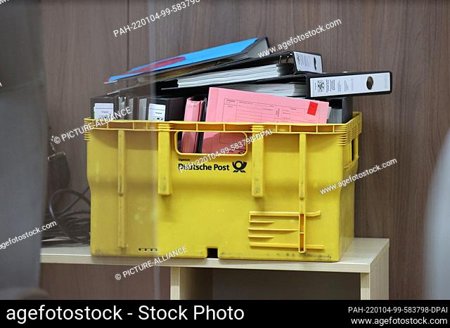 04 January 2022, Thuringia, Gera: Files lie in a mailbox in the courtroom of the district court building. Here, an 18-year-old defendant is being tried