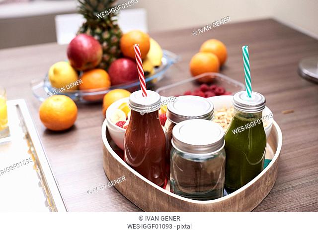 Tray with healthy breakfast on kitchen counter