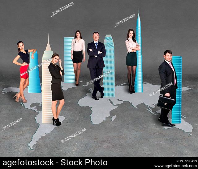 Image of businesspeople standing on the world map