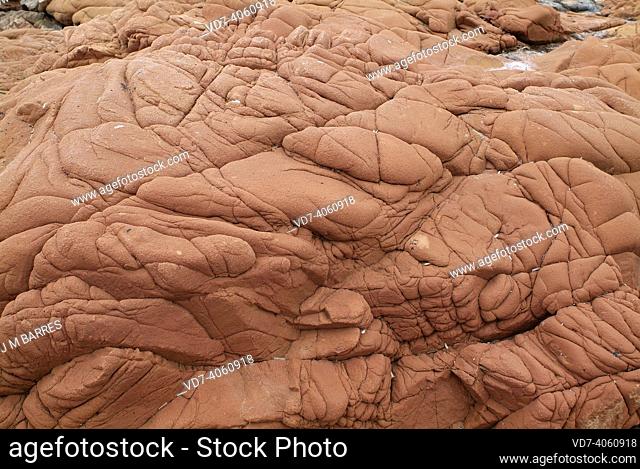 Red granite. Granite is an intrusive igneous rock. This photo was taken in Corsica coast, France