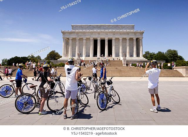 Bicycle tourists visit the Lincoln Memorial in Washington, D.C