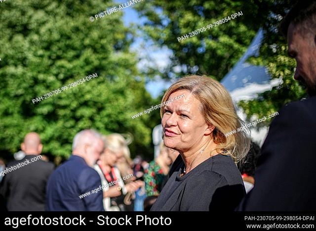 05 July 2023, Berlin: Nancy Faeser (SPD), Federal Minister of the Interior and Home Affairs, takes part in the SPD parliamentary group's courtyard party at the...