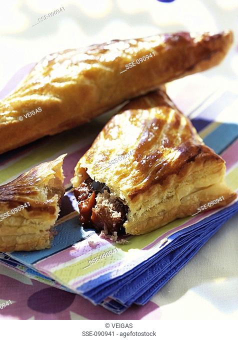 flaky pastry turnovers filled with plums and chocolate ganache topic: plums