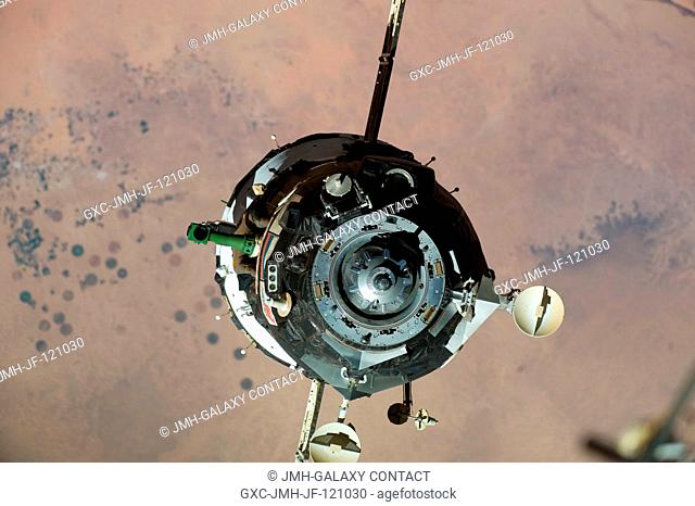The Soyuz TMA-16 spacecraft is featured in this image photographed by an Expedition 22 crew member on the International Space Station during the relocation of...