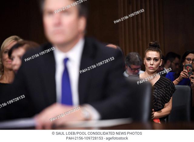 Actress Alyssa Milano (R) listens as Supreme Court nominee Judge Brett Kavanaugh testifies before the US Senate Judiciary Committee on Capitol Hill in...