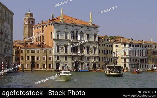 Palazzo Papadopoli with boats on the Grand Canal, Venice, Italy
