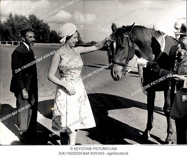 Feb. 05, 1965 - Queen presents the Emperor with a stallion.: H.M. the Queen now on an eight day State visit to Ethiopia - presented her host - Emperor Haile...