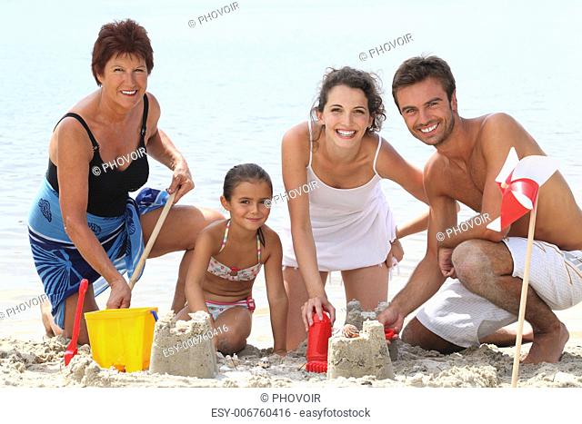 Family having fun at the beach