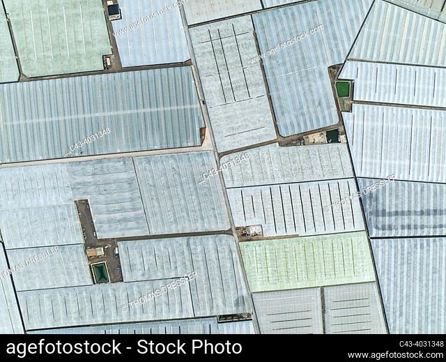 Masses of shimmering plastic greenhouses near El Ejido. Aerial view. Drone shot. Almería province, Andalusia, Spain