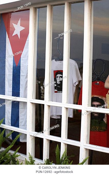 Souvenirs of Che Guevara t-shirts and Cuban flag in shop window at Vinales, Pinar del Rio Province, Cuba, West Indies, Caribbean, Central America