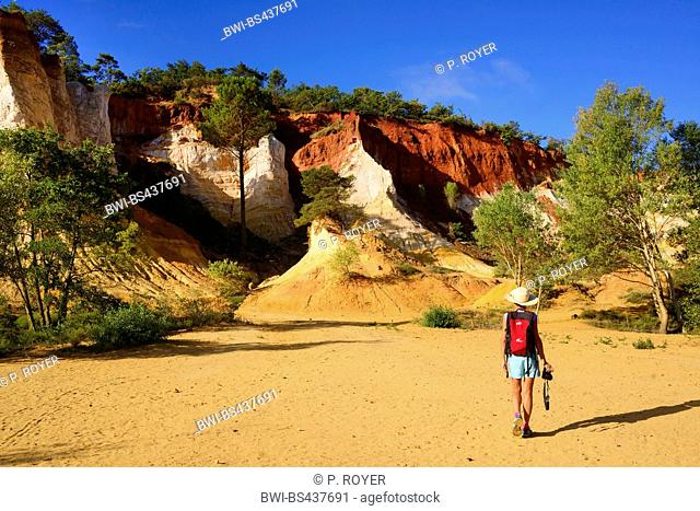 tourist at the ochre rocks of Rustrel, Colorado Provencal, France, Provence, Vaucluse, Rustrel