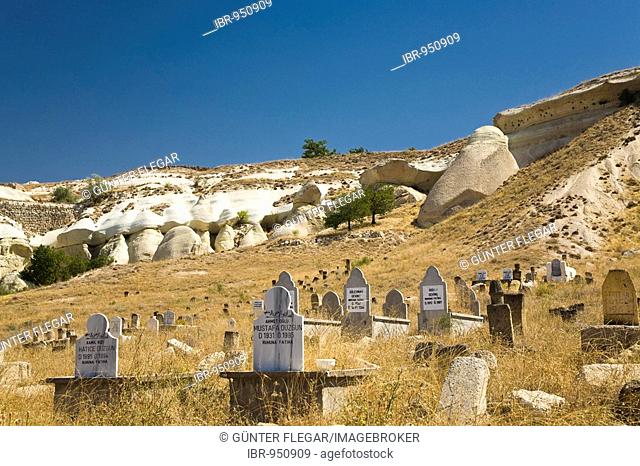 Old cemetery amidst a tuff rock landscape near Goereme, Cappadocia, Central Anatolia, Turkey, Asia
